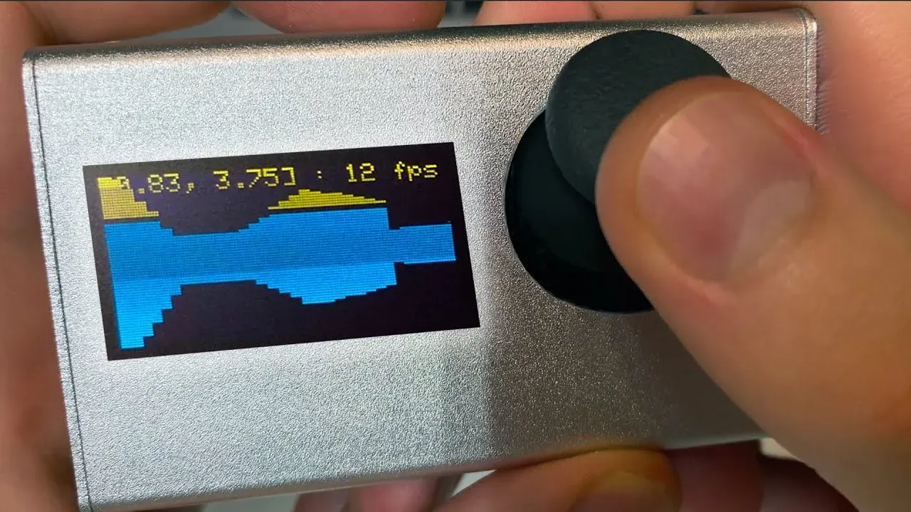 Handheld Arduino game console with a color screen and joystick